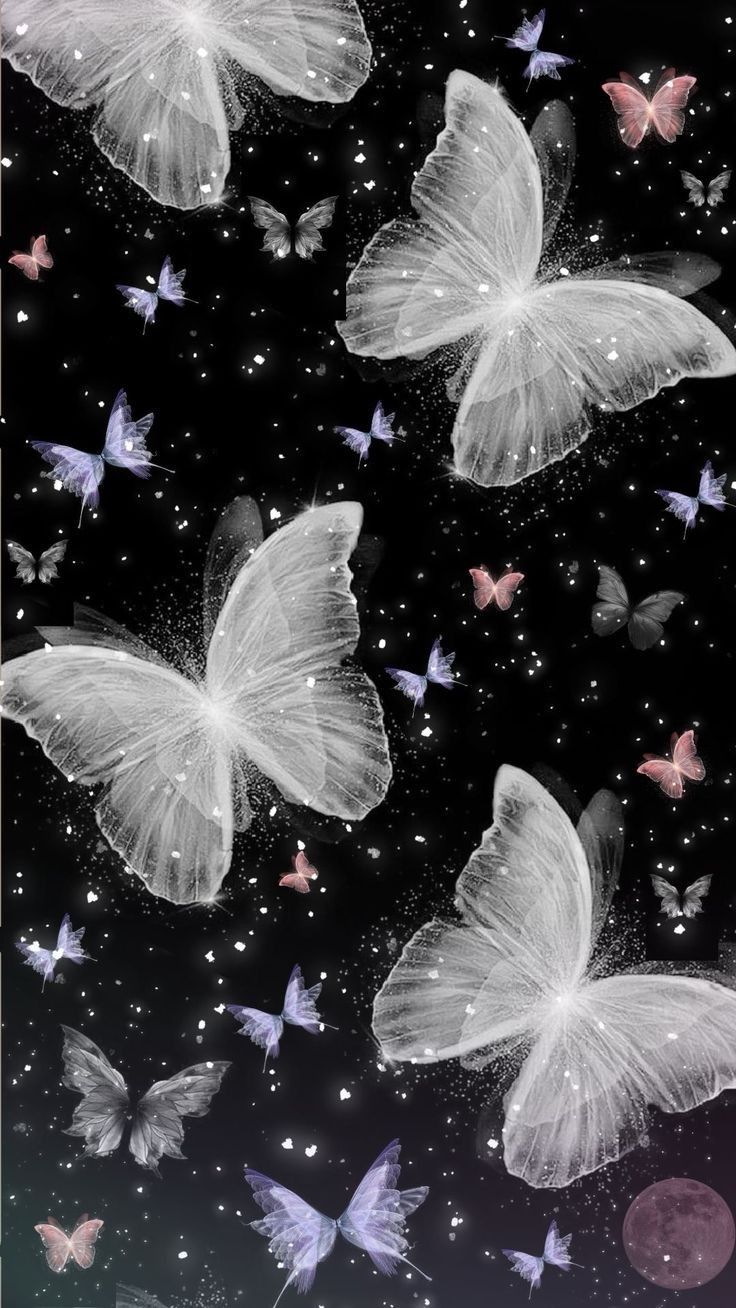 many white butterflies flying in the sky with stars and sparkles all around them on a black background