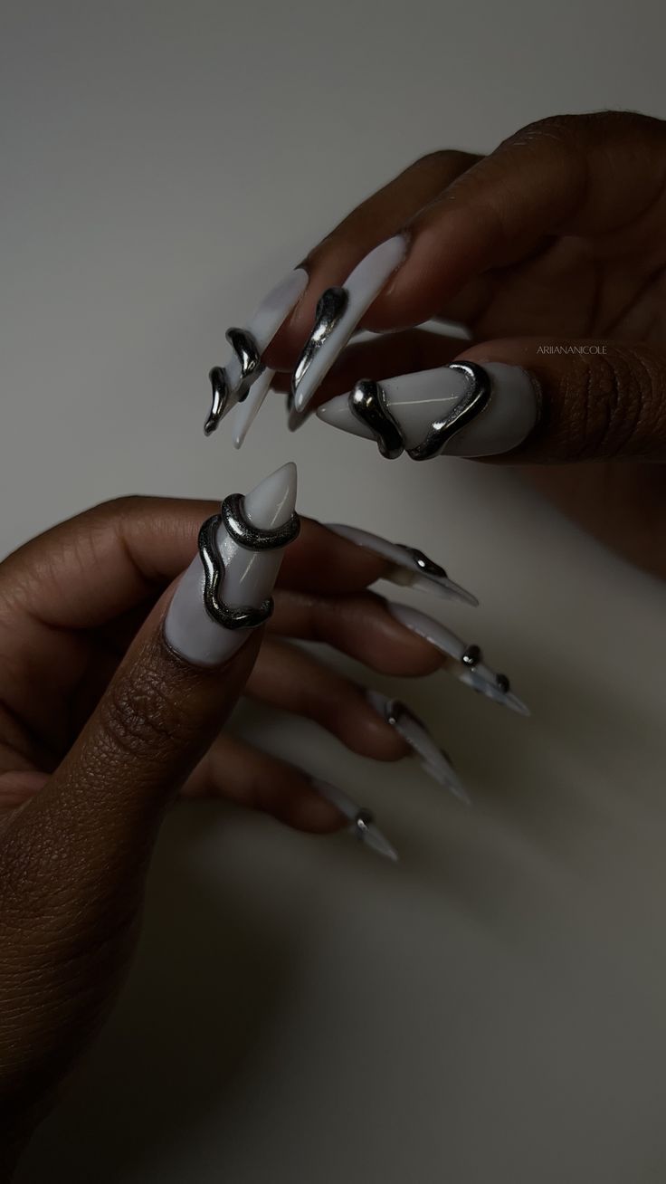 Milky white nails with silver 3D chrome design Chrome Nails Tutorial, 3d Chrome Nails, Milky White Nails, Almond Shaped Nails Designs, Gold Gel Nails, White Almond Nails, White Nails With Gold, Black Gold Nails, Gel X Nails