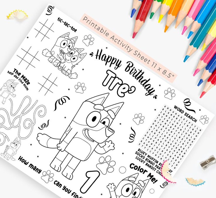 the happy birthday coloring book with colored pencils and crayon pens on it