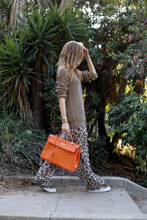 Hermes Birkin Orange, Leopard Trousers, Orange Handbag, Leopard Print Jeans, Branded Outfits, Hermes Orange, Animal Print Outfits, Leopard Print Pants, The Blonde Salad