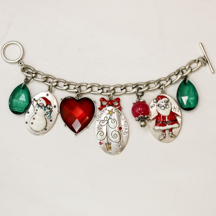 *Nwt Icon Christmas Charm Bracelet With Toggle Clasp *Size = 7" *Nwt Christmas Holiday Bracelet Jewelry, Christmas Holiday Jewelry Bracelet, Christmas Festive Silver Charm Bracelet, Nickel-free Metal Christmas Jewelry, Silver Christmas Holiday Jewelry, Silver Holiday Jewelry, Adjustable Silver Charm Bracelet For Festive Occasions, Adjustable Silver Charm Bracelet For Holiday, Silver Christmas Festive Bracelets