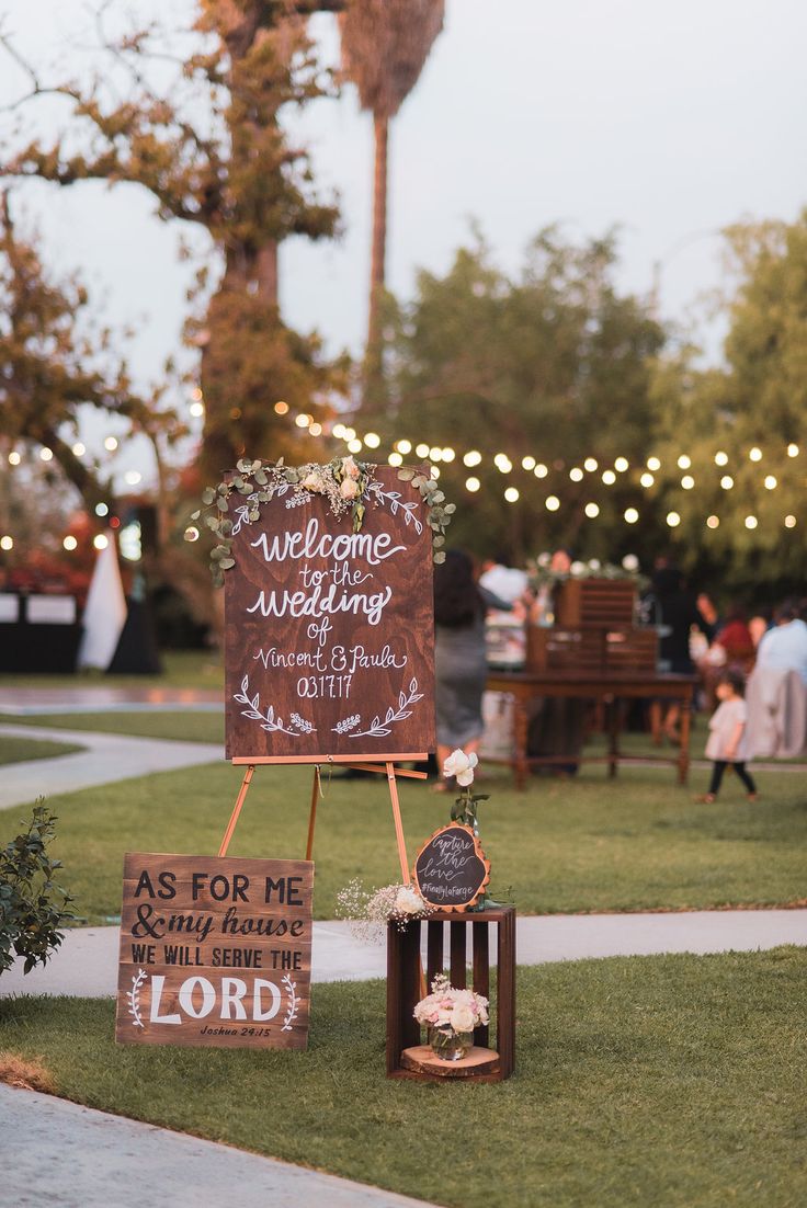 a sign that says welcome to the wedding and as for me i know it is lord