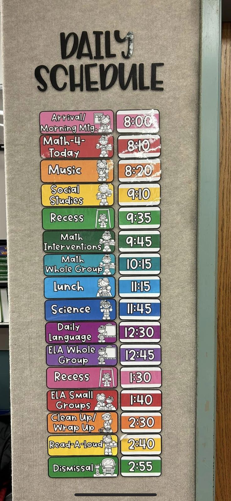 a poster with the daily schedule on it in front of a book shelf filled with books