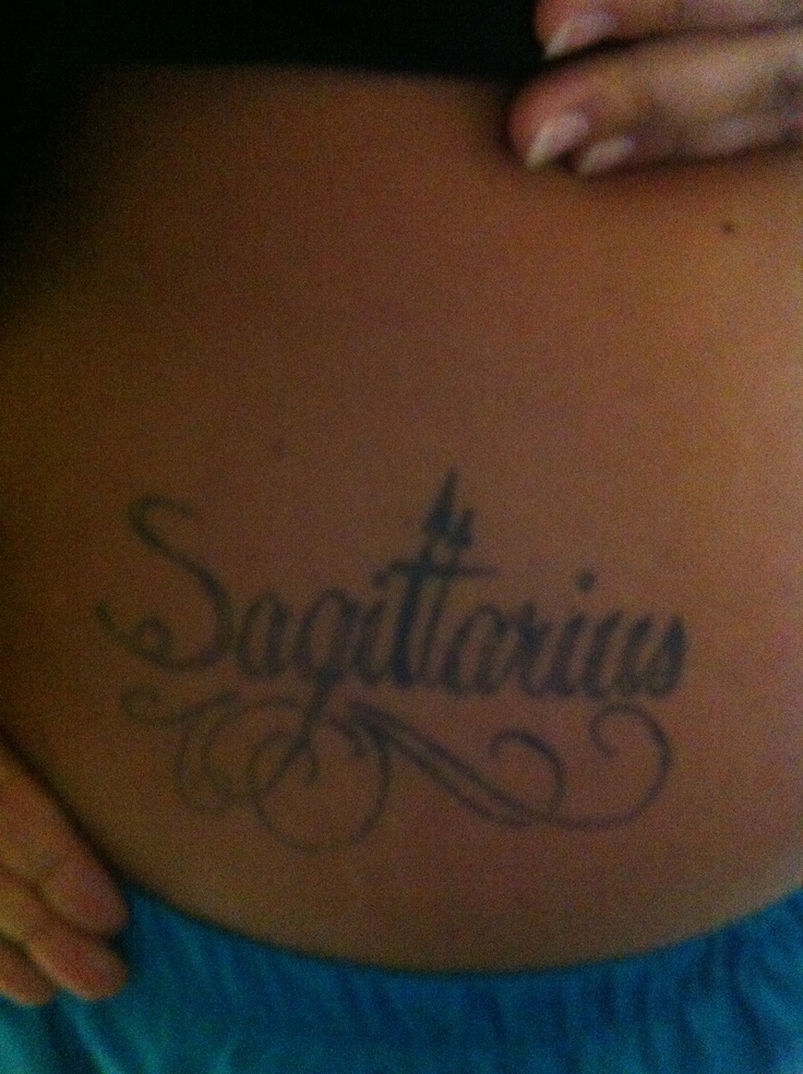 a pregnant belly with the word sagittrinous written on it's side