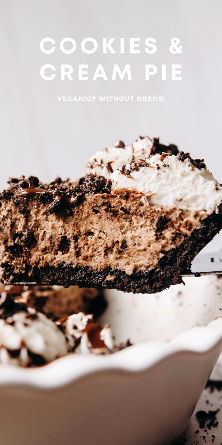 a piece of cake is being held up by a fork with the words cookies and cream pie on it