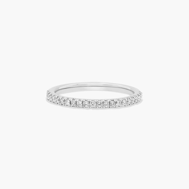 a white gold wedding band with diamonds