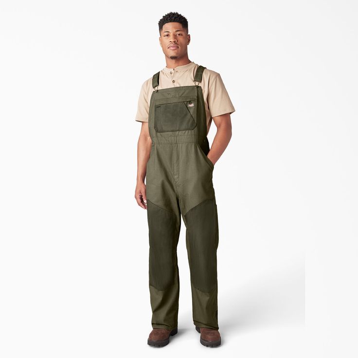 The original Dickies workwear style is updated with archival details in our waxed canvas men’s overalls. The bib overalls are built from 100% cotton duck canvas with a Durable Water Repellent finish. They have rugged, wax-coated double front panels as well as wax-coated details on the chest pocket and kickplate. A relaxed fit, durable metal hardware, and functional knife and tool pockets complete this essential work style. Work Wear Men Workwear, Painting Overalls, Farmer Clothes, Workwear Fashion Men, Farmer Overalls, Gardening Overalls, Coverall Outfit, Work Wear Men, Mens Coveralls