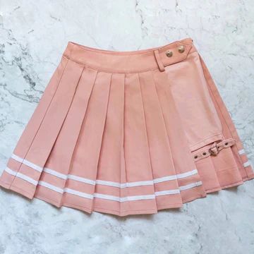 Pastel pink pleated schoolgirl skirt with white striping and a leg strap. The skirt comes with attached hidden shorts underneath. Sakura Skirt, Pink Tennis Skirt, Pastel Skirt, Outfits Juvenil, Skirt Streetwear, School Skirt, Pink Mini Skirt, Shein Outfits, Pink Outfits