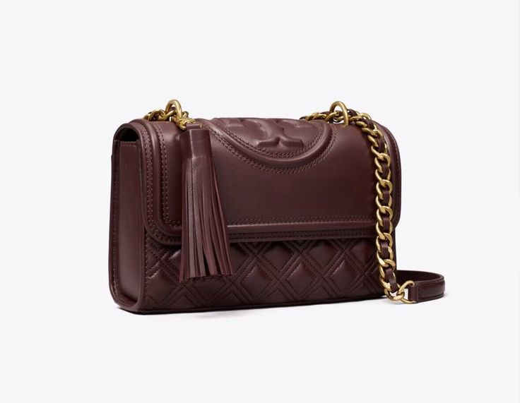 Height: 5.3" (13.5cm); length: 8.3" (21cm); depth: 2.6" (6.5cm) Napa leather Flap with magnetic snap closure Convertible chain and leather interwoven shoulder strap with 22.2" (56.5cm) drop: leather shoulder guard for comfort 1 exterior back slit pocket, 2 interior pockets, 1 interior zipper pocket Clip on leather tassel Dust bag included Small Shoulder Bags Style Number 75576 Shoulder Guard, Bags Style, Small Shoulder Bags, Pocket Clip, Leather Tassel, Clip On, Snap Closure, Zipper Pocket, Fashion Bags