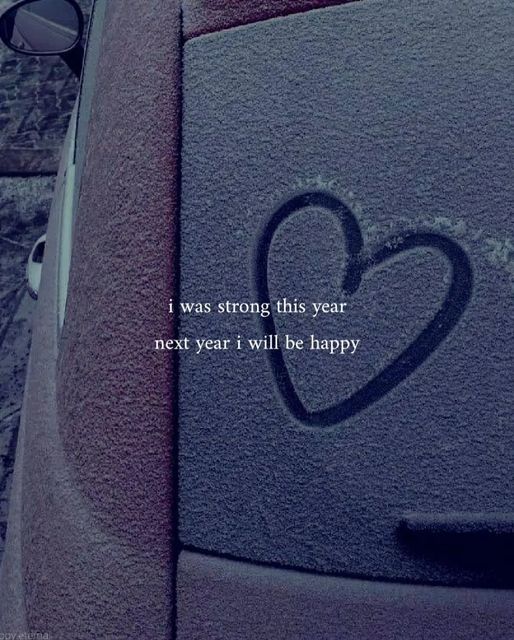 a heart drawn on the side of a car with a message written in it that says, i was strong this year not year i will be happy