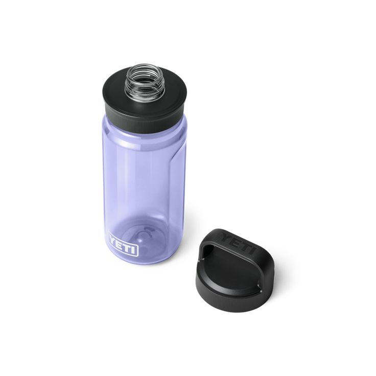 a purple water bottle next to a black lid