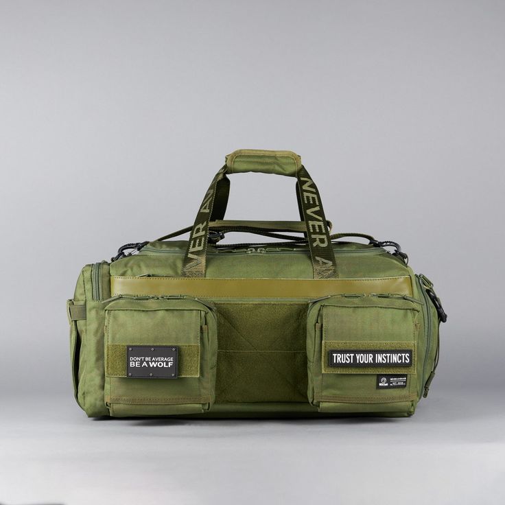 Introducing the pinnacle of travel companions: The Ultimate 40L Duffle Bag made with 1000D Oxford Waterproof Material and YKK Zippers and Clamps. This exceptional bag is meticulously designed to cater to all your needs, from jet-setting adventures to gym sessions and beyond. If anyone can make a duffle bag better, its WOLFpak! Unmatched Versatility: With a spacious 40-liter capacity, this duffle bag offers ample space for all your essentials, ensuring you're prepared for any journey. Its adaptab Durable Sporty Duffle Bag For Outdoor, Sporty Durable Duffle Bag For Outdoor, Functional Large Capacity Duffle Bag For Overnight Trips, Waterproof Functional Duffle Bag For Outdoor Activities, Multifunctional Green Travel Bag For Outdoor, Sporty Green Duffle Bag For Overnight Trips, Waterproof Practical Gym Bag For Outdoor Activities, Practical Waterproof Gym Bag For Outdoor Activities, Practical Waterproof Gym Bag For Outdoor