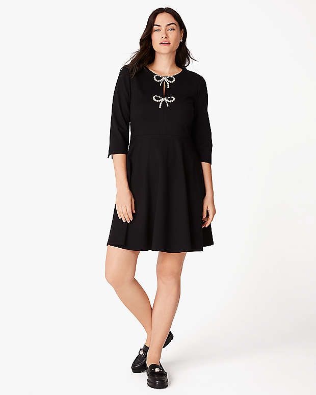 Pearl Bow Ponte Dress | Kate Spade Outlet Stretch Viscose Dress For Work, Stretch Cotton Dresses For Fall, Elastane Stretch Dress For Daywear, Stretch Elastane Dresses For Daywear, Stretch Elastane Dress For Daywear, Casual Knee-length Elastane Dresses, Casual A-line Dress With Back Zipper, Casual Fitted Dress With Back Zipper, Casual Long Sleeve Dress With Back Zipper