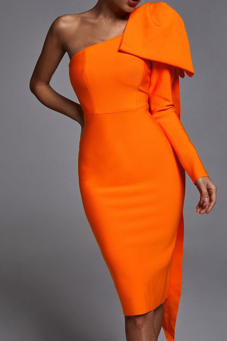 In a one-shoulder silhouette with ruffled details, this midi dress offers chic style for any special occasion or night out on the town. The Abbey One Shoulder Bandage Dress features a sleeveless bodice on one side with a one shoulder neckline, one long bow topped draped cape sleeve, and a center back slit. The tight bodycon fit lets you flaunt your curves from every angle. Materials: Bandage (90% Rayon, 9% Nylon, 1% Spandex) Care on reverse Model wearing size S Model Stats: Height - 5.7"/174cm Winter Wedding Guest Dress, Long Bow, Midi Party Dress, Asymmetrical Midi Dress, One Shoulder Midi Dress, Bandage Midi Dress, One Clothing, Stylish Clothes For Women, Bandage Dress