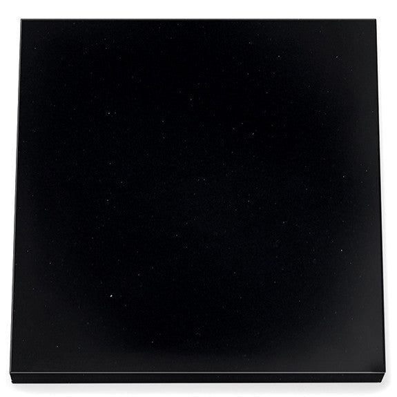 a black square shaped object on a white background