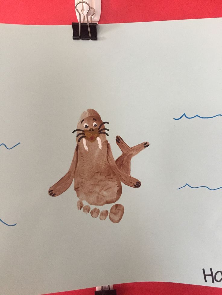 a child's drawing of an otter floating in the water with his feet up