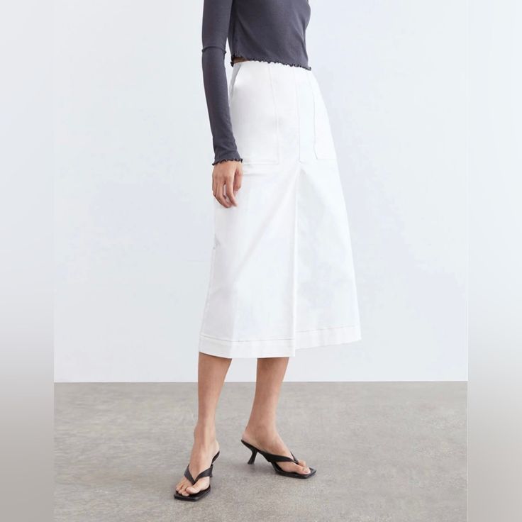 New With Tags White Cotton Midi-length Bottoms, White Cotton Midi Bottoms, Chic White Culottes With Pockets, White Midi-length Bottoms For Summer, White Midi Length Skirt With Pockets, White Midi Length Bottoms For Summer, White Midi Bottoms For Summer, White Midi Skirt For Spring, White Elegant Culottes For Spring