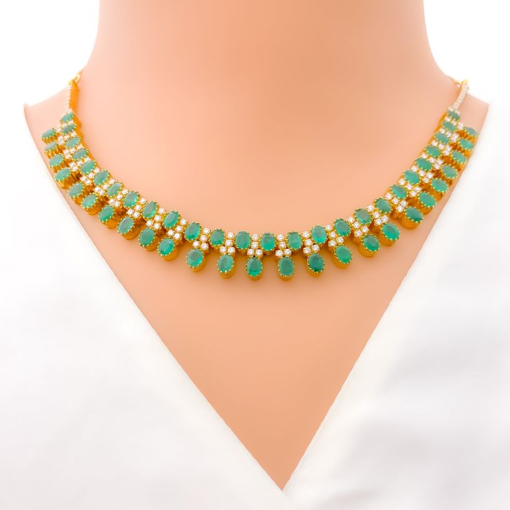 This exquisite 18k yellow gold necklace set, weighing 41.8 grams, features a luxurious design adorned with dazzling diamonds and vibrant emeralds. The yellow gold finish enhances its elegant appeal, making it perfect for any special occasion. The set includes a necklace with a total diamond weight of 2.95 carats, featuring F-G color and VS quality diamonds. The necklace has a length of 15 inches with adjustable 1.1-inch links and is secured with a hook lock. The matching earrings, each measuring Gold Plated Emerald Necklace For Formal Events, Formal Gold Plated Emerald Necklace, Formal Gold-plated Emerald Necklace, Elegant Hand-set Emerald Necklace In Yellow Gold, Elegant Yellow Gold Hand Set Emerald Necklace, Emerald Necklace With 17 Jewels For Celebration, Festive Yellow Gold Emerald Necklace With Gemstone, Gift Yellow Gold Emerald Necklace Hand Set, Traditional Yellow Gold Emerald Necklace For Formal Occasions