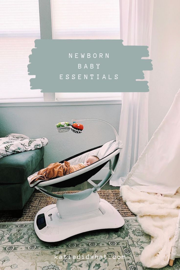 a baby in a cradle on top of a scale with the words newborn essentials above it