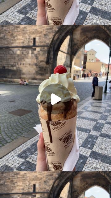 there is an ice cream sundae being held up in front of the camera,