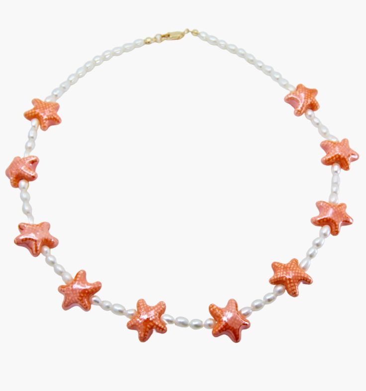 Meet our seastar necklace with colorful starfish charms - they're like little high-fives from the sea, designed to make you smile with every wear. Each necklace is a beach vacation you can carry around, a keepsake that whispers tales of sandy toes and salty air.
Length: 18" Summer Starfish Charm Star Necklace, Star Charm Necklace For Summer, Beach Star Charm Necklace, Starfish-shaped Necklace With Starfish Charm For Summer, Starfish Shell Necklace As A Gift, Pink Starfish Charm Jewelry, Star Charm Necklace For Beach, Star Charm Necklaces For Beach, Summer Star Charm Necklace As Gift