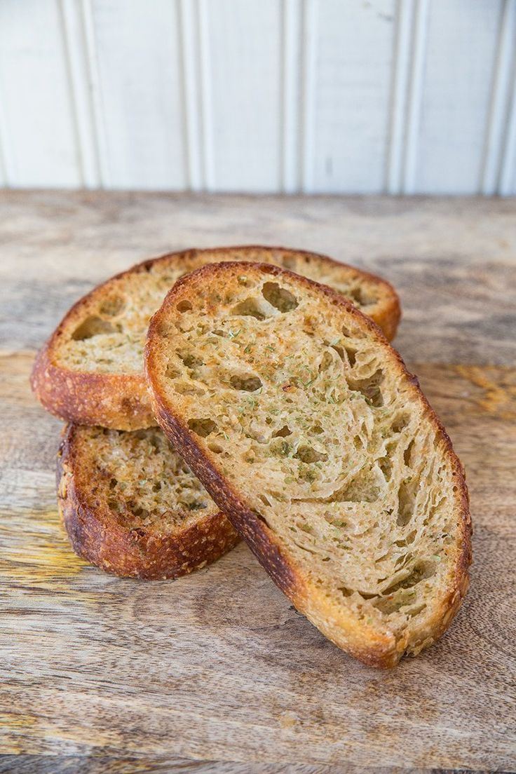 homemade sourdough garlic toast cut in half