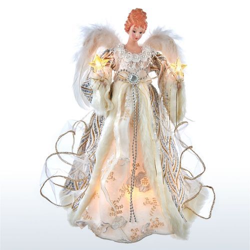 an angel figurine with white wings and gold trimmings on it's body