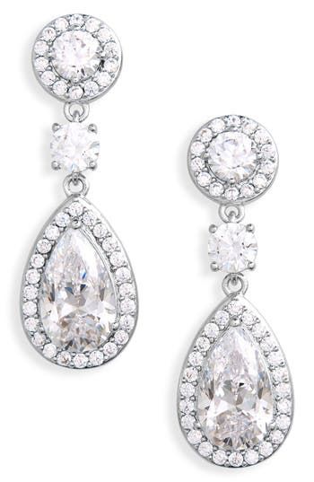 Pavé trim adds a shimmering border to these rhodium-plated sterling silver drop earrings host to a stunning mix of cubic zirconia. 1" drop; 3/8" width Post back Cubic zirconia/sterling silver/rhodium plate Imported Silver Bridal Earrings With Pave Setting For Formal Occasion, Formal Silver Bridal Earrings With Pave Setting, Teardrop Chandelier Earrings With Diamond Accents, Formal Bridal Earrings With Pave Setting, White Gold Teardrop Cubic Zirconia Chandelier Earrings, Cubic Zirconia Brilliant Cut Dangle Earrings, Cubic Zirconia Dangle Linear Earrings In Brilliant Cut, Glamorous Sterling Silver Bridal Earrings With Diamond Accents, Silver Linear Earrings With Brilliant Cut For Anniversary