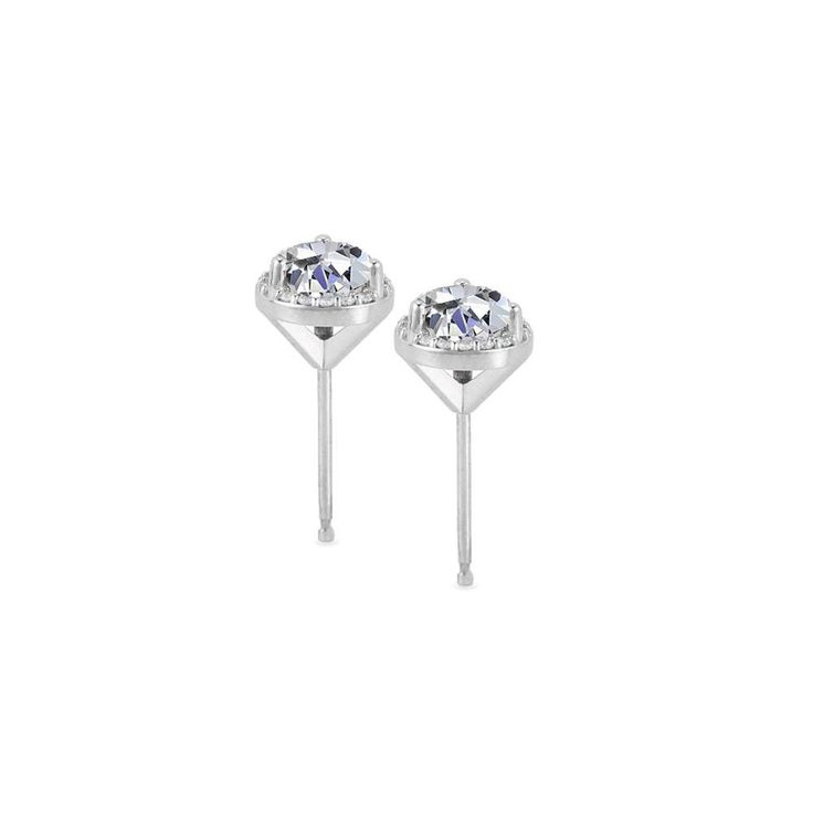 This matching pair of women's earrings features 26 round cut natural diamonds and 1/3ct center stones. All diamonds are set in solid 14k white gold and secured by 10k white gold push backs. Anniversary Sterling Silver Halo Diamond Earrings, Sterling Silver Halo Diamond Earrings For Anniversary, Diamond Earrings With Prong Setting, Silver Moissanite Diamond Earrings With Halo Design, Silver Moissanite Halo Diamond Earrings, Diamond White 14k White Gold Earrings With Halo Design, White Gold Halo Diamond Earrings In Sterling Silver, Classic White Gold Earrings With White Topaz, Anniversary Diamond Earrings With Round Stones