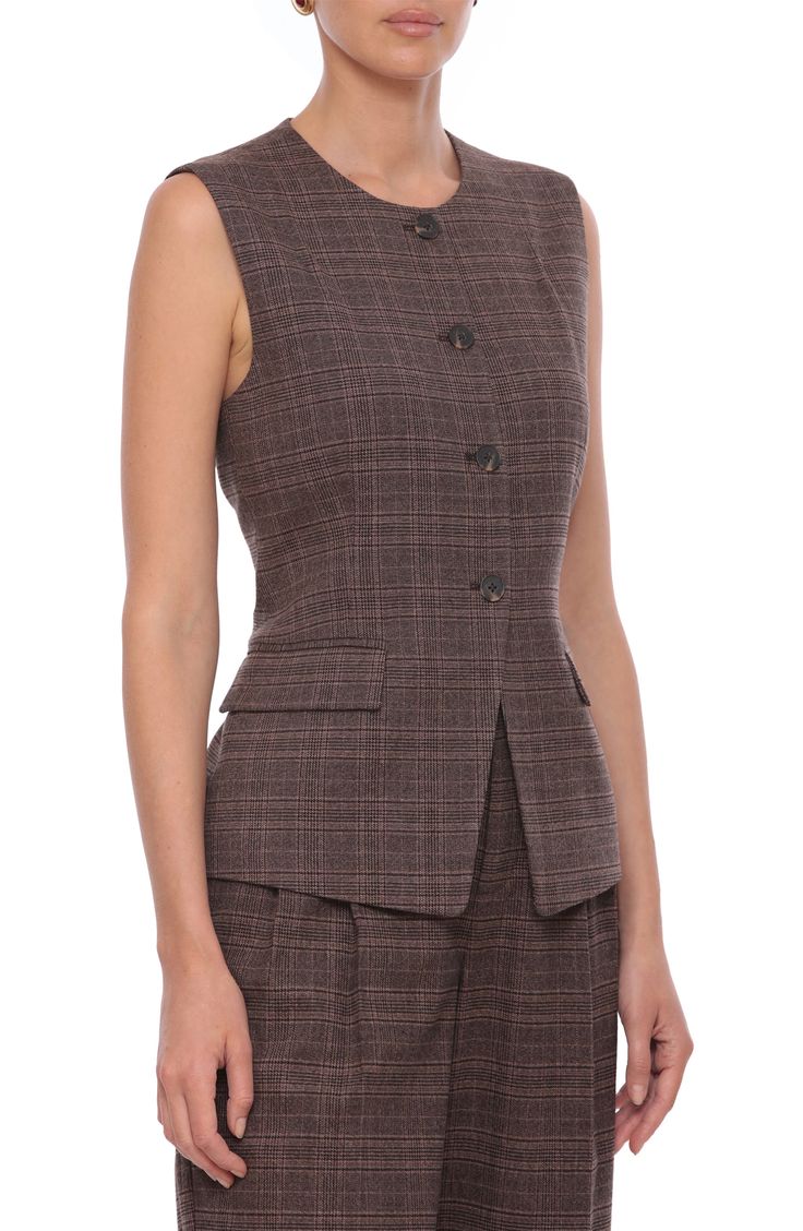 Allover plaid brings timeless appeal to this work-to-play vest punctuated with a cutaway hem for a flared silhouette. Front button closure Jewel neck Decorative pocket flaps Back vent Lined 64% polyester, 34% viscose, 2% spandex Machine wash, lien dry Imported Vests For Women, Faux Leather Vest, Plaid Vest, Casual Vest, Outerwear Vest, Leather Vest, Jewel Neck, Womens Plaid, Outerwear Women