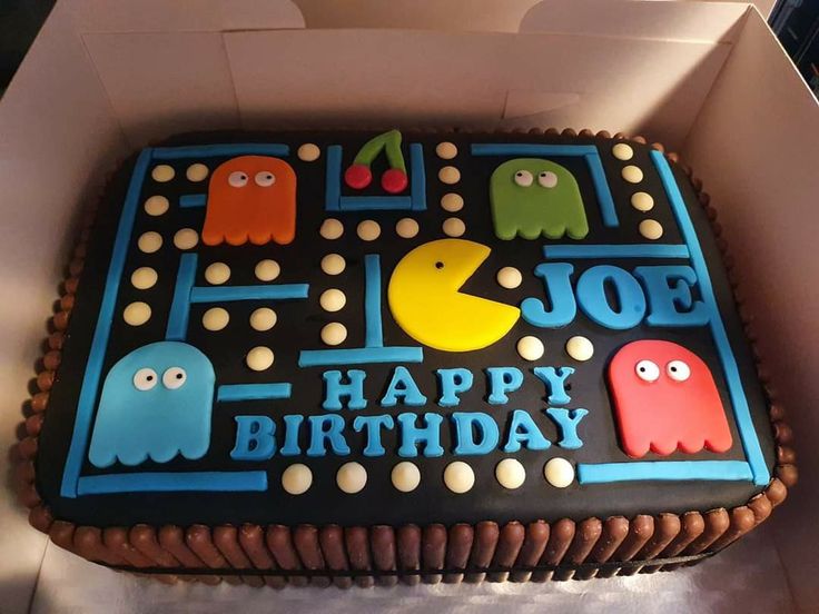 a birthday cake in the shape of a pacman game