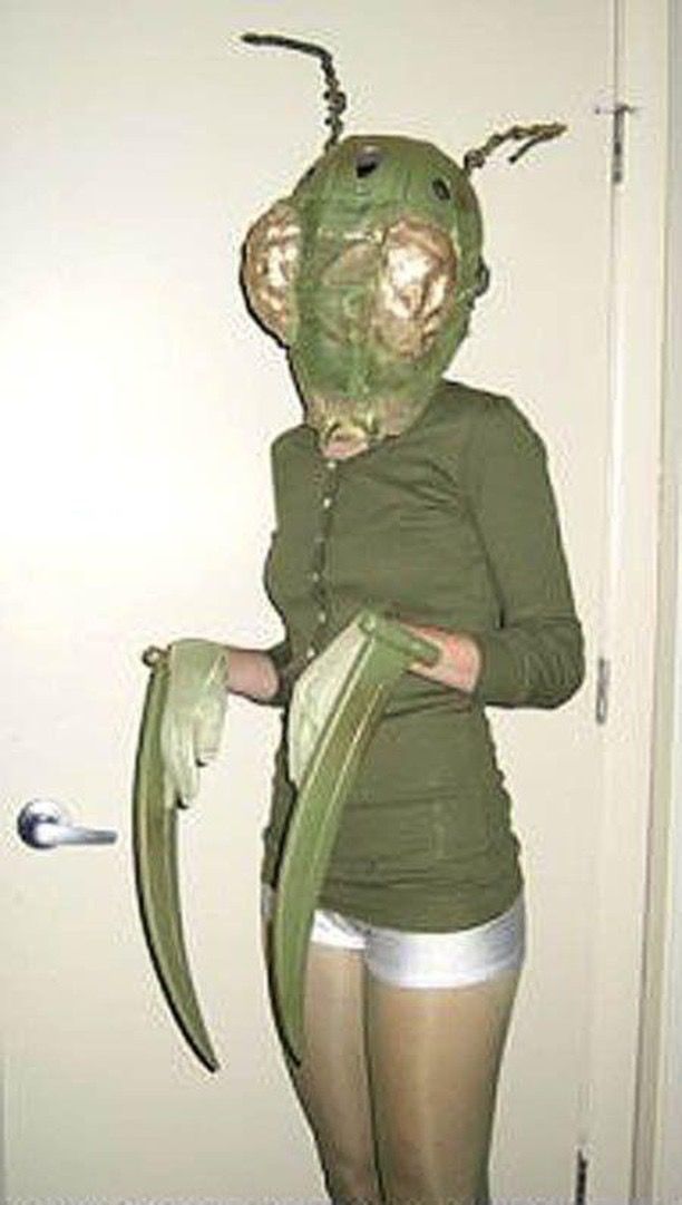 a woman is dressed up as a creature