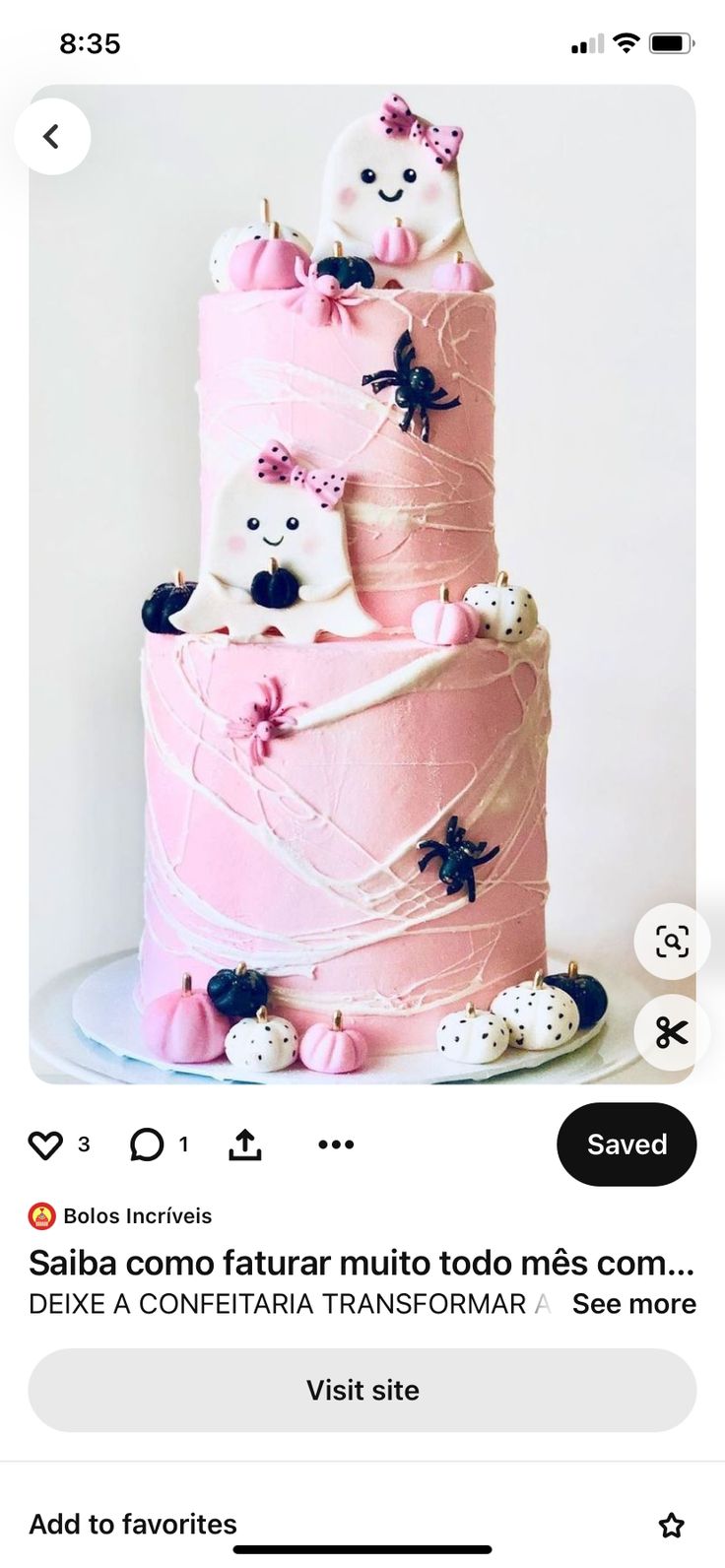 a pink cake with white frosting and black decorations on the top is featured in an instagram