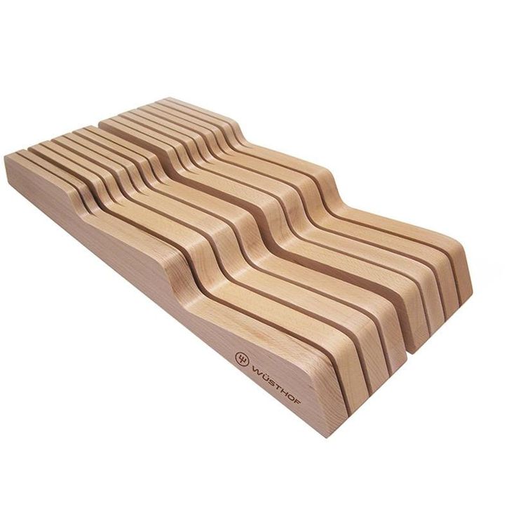 a set of five wooden coasters with wavy lines on the top, and bottom