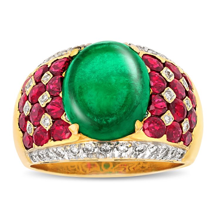 A mesmerizing cabochon emerald weighing 5.50 carats exhibits a deep green hue in this bombe-style ring. The domed bombe form is crafted of 18K yellow gold and is set with rich rubies totaling 2.50 carats and sparkling diamonds totaling approximately 0.40 carat. Golconda Diamond, Colombian Emerald Ring, Ruby And Diamond Ring, Platinum Diamond Rings, Colombian Emeralds, Cabochon Ring, Green Gems, 18k Yellow Gold Ring, Fine Jewels