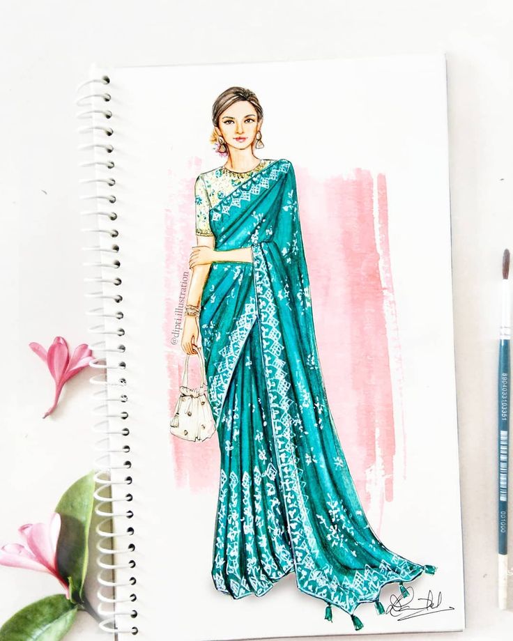 a notebook with a drawing of a woman in a sari holding a handbag