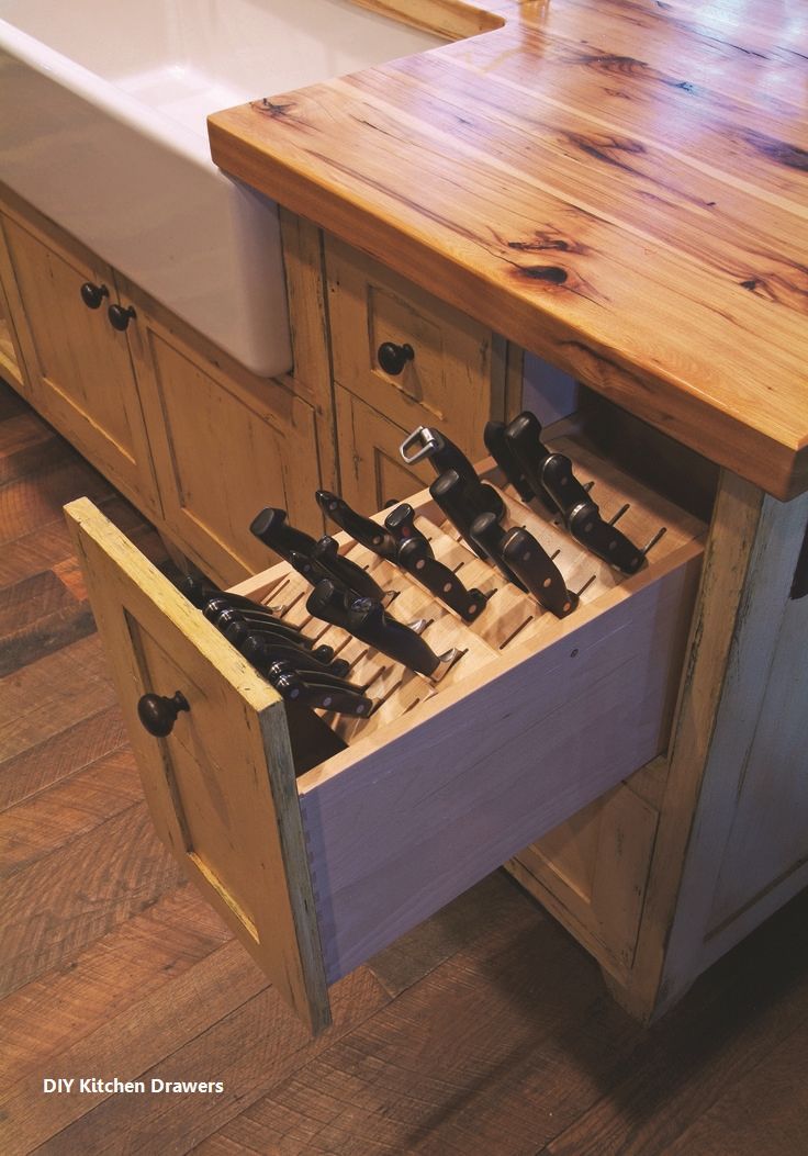 a wooden cabinet with wine bottles in it and a sink on the other side,