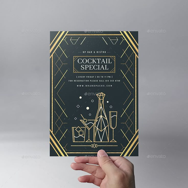 a hand holding up a black and gold cocktail party card with the words cocktail special on it