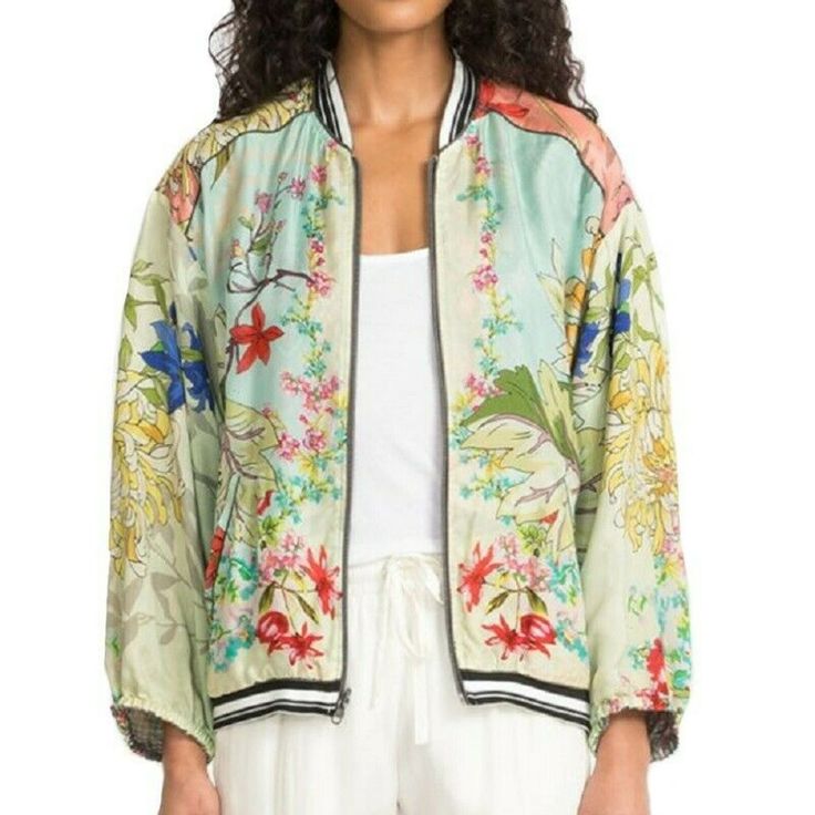 65% Cupra/35% Rayon Reversible Zipper Measurements For Size Medium: Length- 24 1/4", Bust- 25" Care Instructions: Dry Clean Only With Two Ways To Wear, Our Reversible Mizumi Bomber Pairs Stylish Form With Bohemian Ease. This Trendy Jacket Features Lush Botanical Prints, Sporty Accents, And A Laid-Back Form. Whether You’re Looking To Dress It Up Or Down, You Can Effortlessly Style This Jacket With Light-Washed Denim Or Leggings And Flats For A Chic Boho Look. Casual Long Sleeve Silk Outerwear, Casual Silk Outerwear For Work, Green Silk Outerwear For Spring, Trendy Jackets, Military Style Jackets, Boho Look, Johnny Was, Military Fashion, Botanical Prints