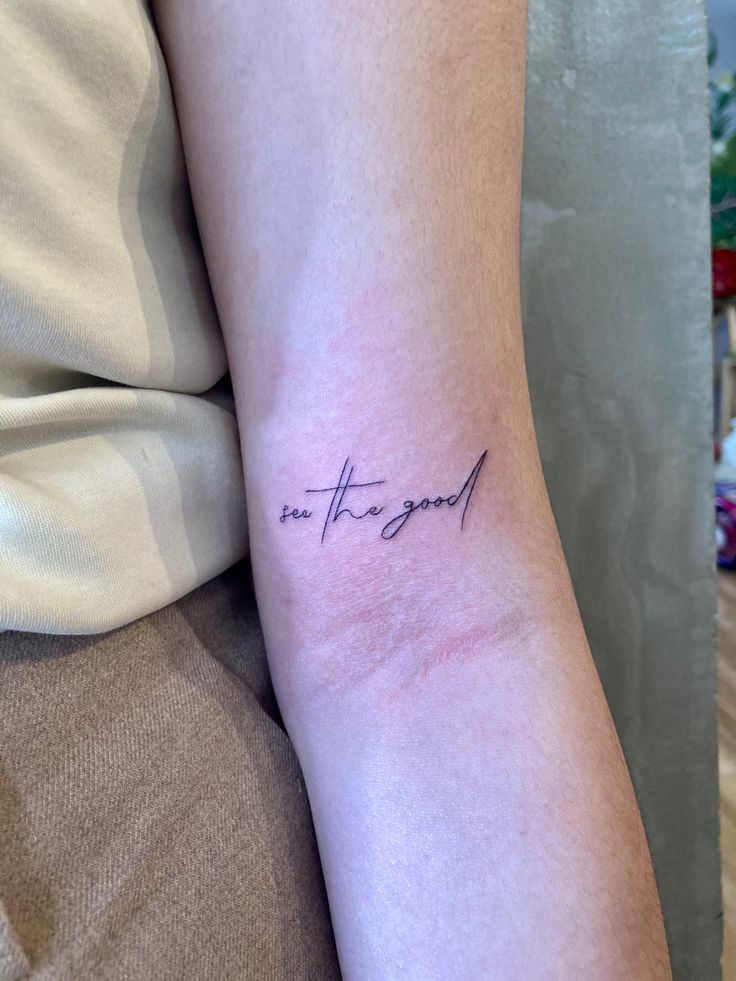 a woman's arm with a tattoo that says, not the good on it