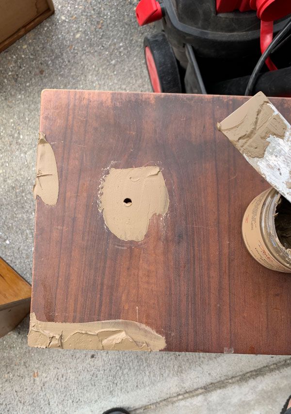 a piece of wood that has been stained brown