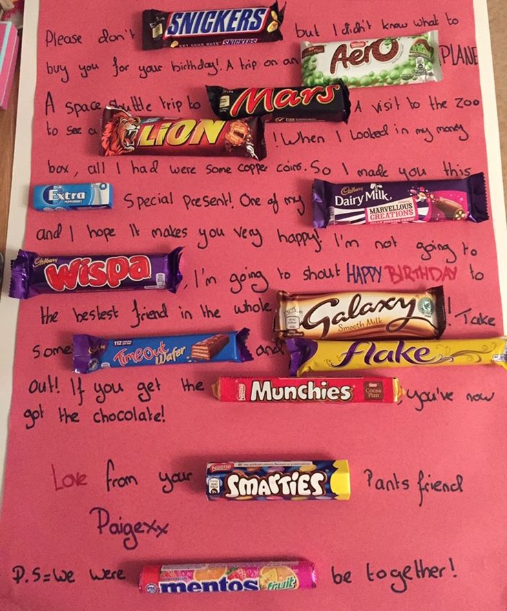 a pink bulletin board with candy bars on it and writing in the middle that says, i love you so much