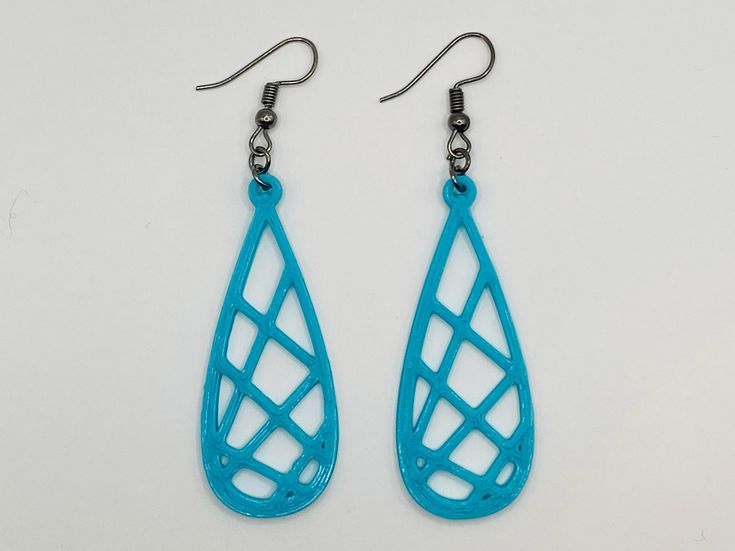 Geometric design 3D printed earrings with hypoallergenic hooks, and very lightweight. Printed with PLA (Polylactic Acid). *Due to the nature of 3D printing there may be slight variations and imperfections. 3d Earrings, 3d Printed Earrings, 3d Printed Jewelry, Geometric Design, 3d Printing, Jewelry Earrings Dangle, Etsy Earrings, Dangle Drop Earrings, Dangle Earrings