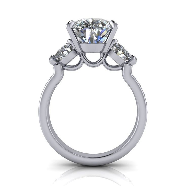 an engagement ring with three stones on the side