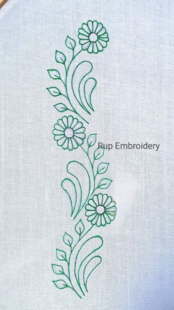 the embroidery is stitched with green thread and has flowers on it's side