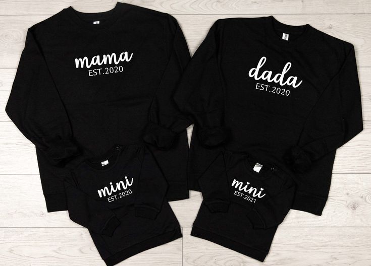 The cutest family matching sweaters for your new family! Sold separately this way you can purchase them individually if you wish. You pick the year you would like on each sweater.  There are two mini design options for infants/toddlers. One has hearts over the i's and one does not. Usually Ships in 1-4 business days. Designs are Vinyl Washing Instructions: Turn garment(s) inside out prior to washing. Machine wash cold, tumble dry on delicate.  Do not use bleach or fabric softeners. By purchasing, you are supporting a small mama owned business. Thank you! Mama Dada Baby Shirt, Family Sweaters Matching, Family Matching Long Sleeve Sweatshirt With Name Print, Customizable Long Sleeve Family Matching Sweatshirt, Family Matching Black Sweatshirt For Winter, Family Matching Black Winter Sweatshirt, Family Matching Sweatshirt For Fall, Family Matching Long Sleeve T-shirt, Family Matching Long Sleeve Sweatshirt