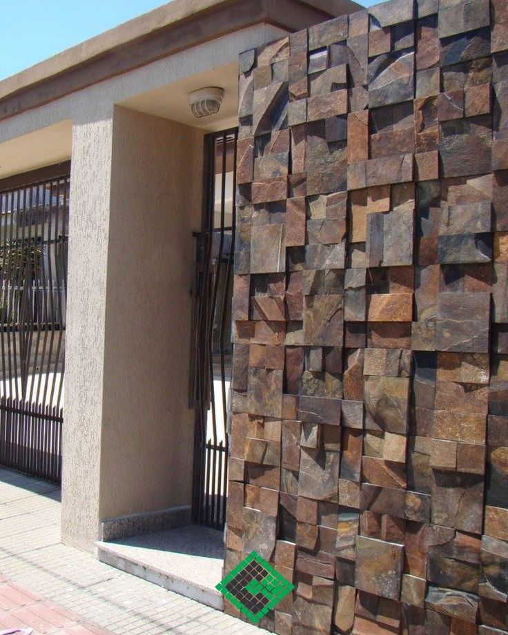 a building that has a bunch of rocks on it