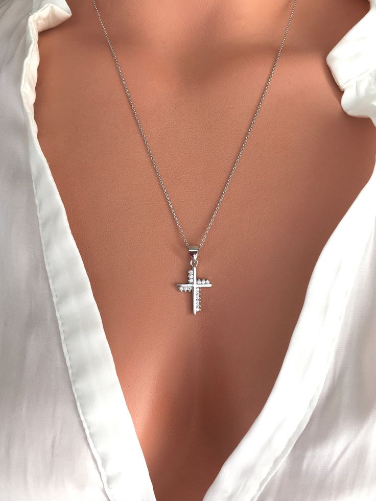 Crucifix Metal Jewelry, Silver Cross Pendant Charm Necklaces, Silver Cross Clavicle Chain Necklace, Stainless Steel Cross Necklace For Anniversary, Silver Cross Pendant Charm Necklace With Clavicle Chain, Crucifix Charm Necklaces For Gifts, Silver Crucifix Charm Necklace For Gift, Metal Crucifix Necklace As Gift, Gift Crucifix Charm Necklace