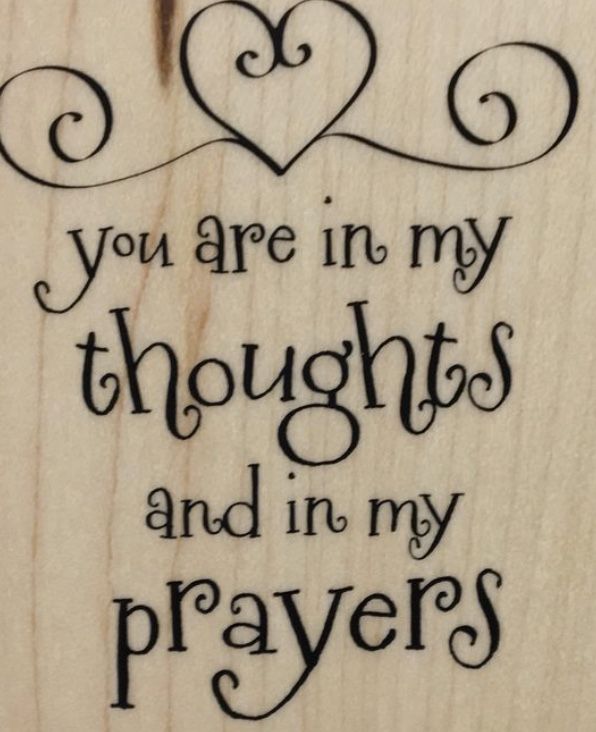 a wooden plaque with the words you are in my thoughts and in my prayers