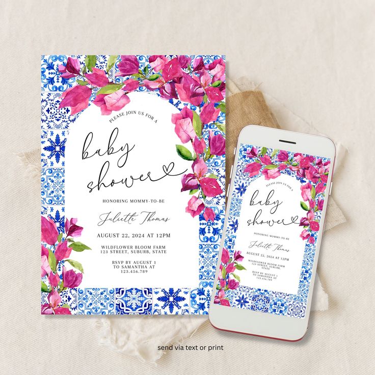 an image of baby shower with flowers on it and a cell phone next to it